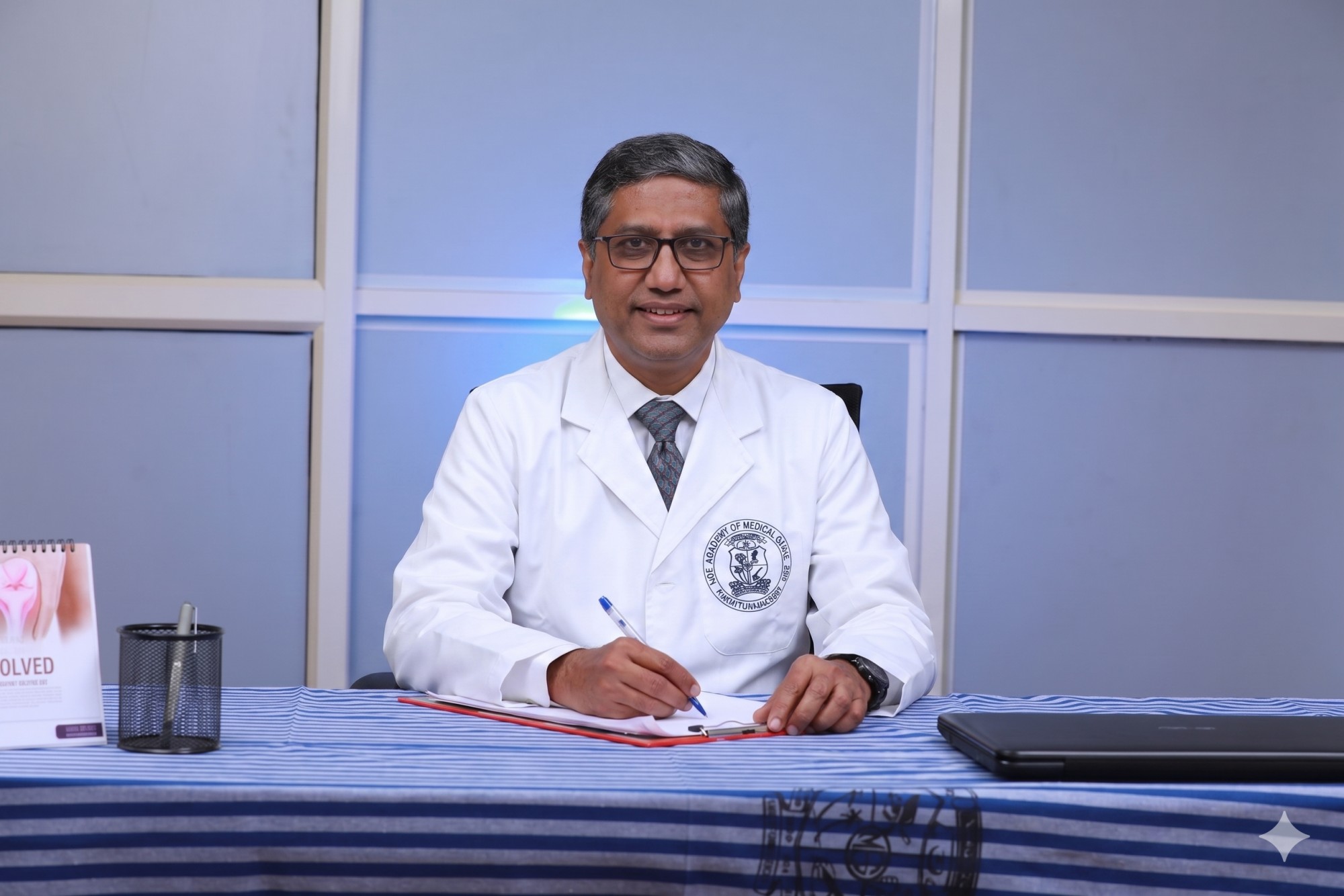 Dr. Girish Raj