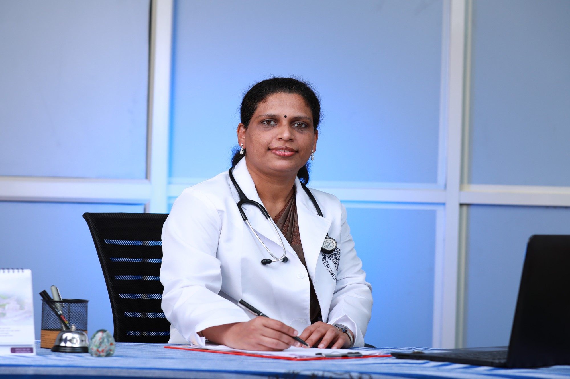 Dr Bindu A