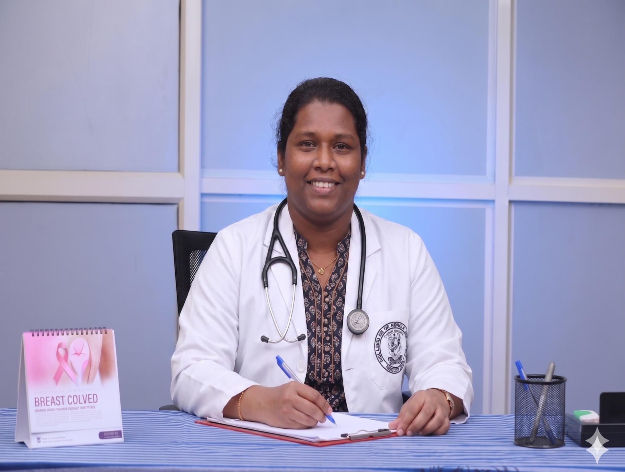 Dr.Ria M