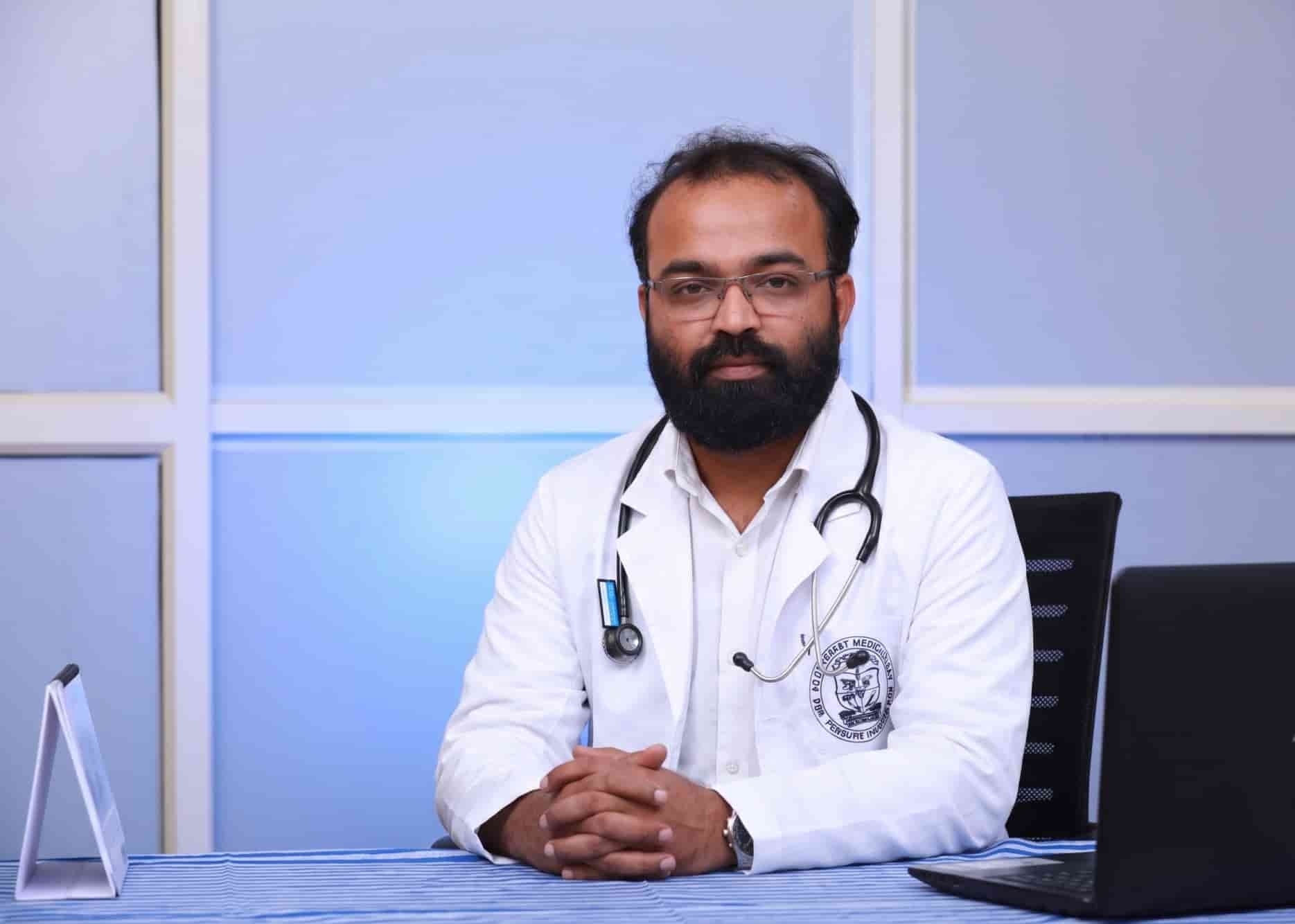 Dr. Abdusamad V