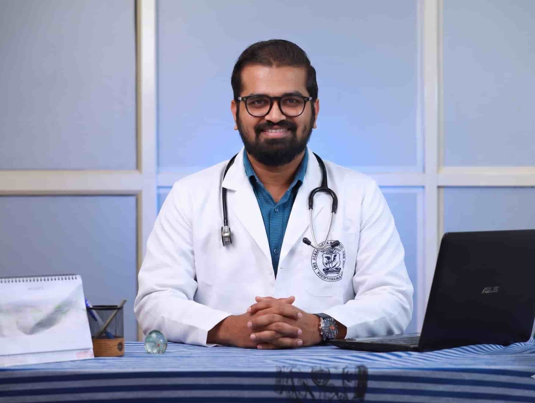 Dr. Jibin C J