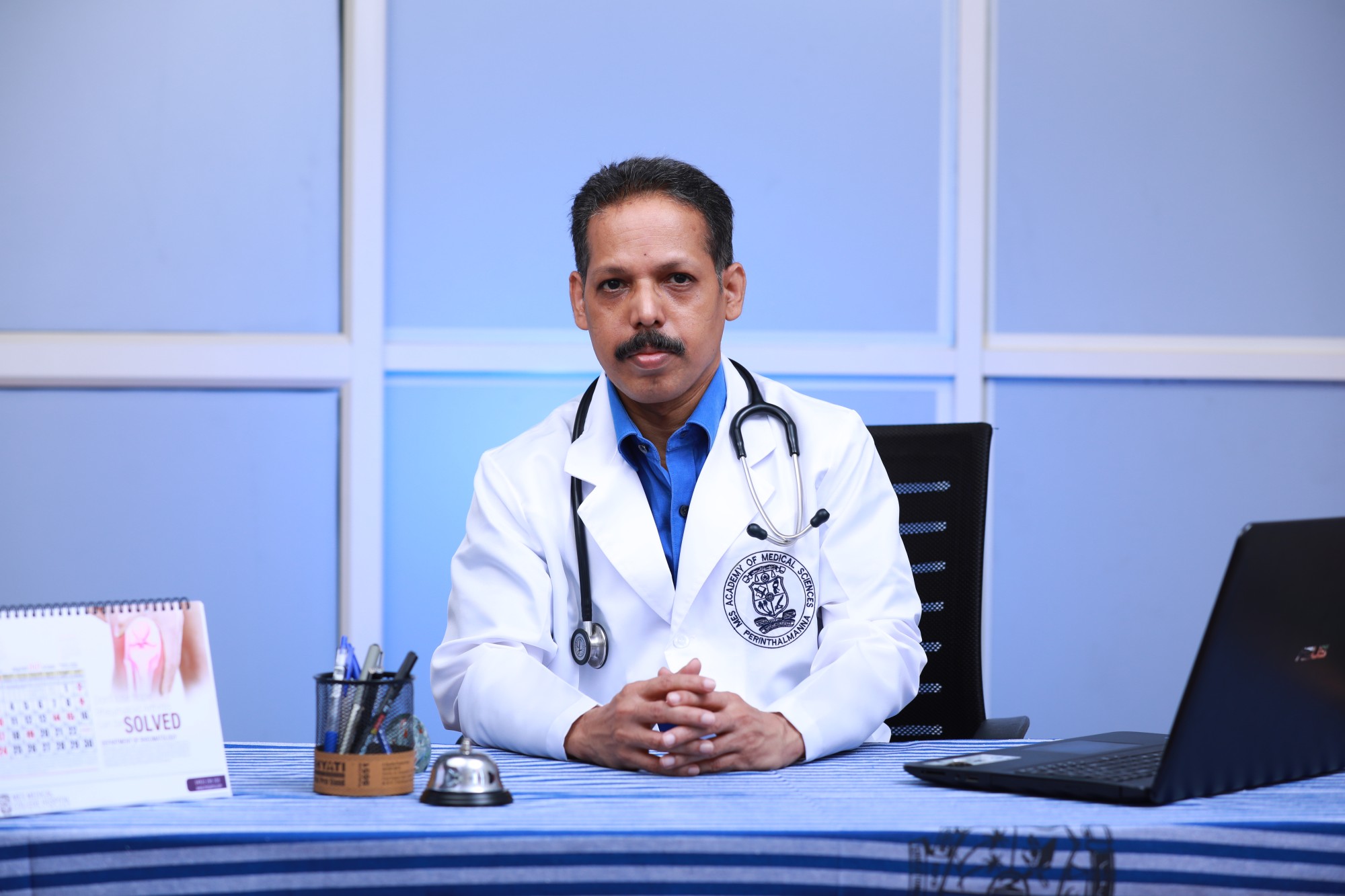 Dr.Premkumar K